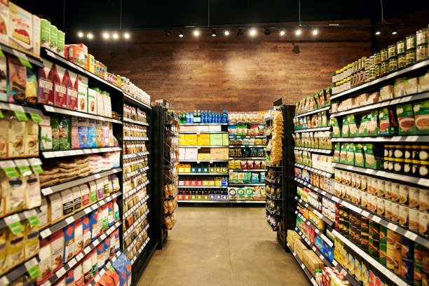 Shot of fully stocked isles in a grocery store during the day